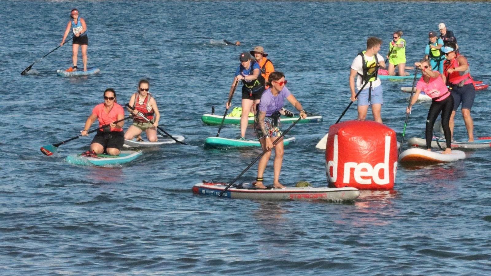 The Paddle Fleet rounding the first buoy